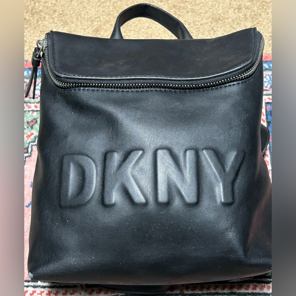 Small DKNY black vegan leather backpack in good condition